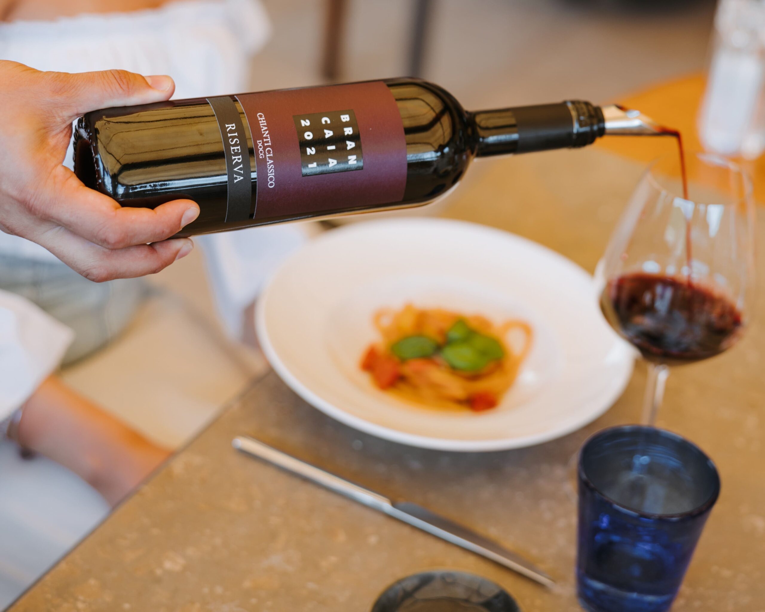 Wine tasting in the tasting room of Brancaia winery with a wide selection of wines